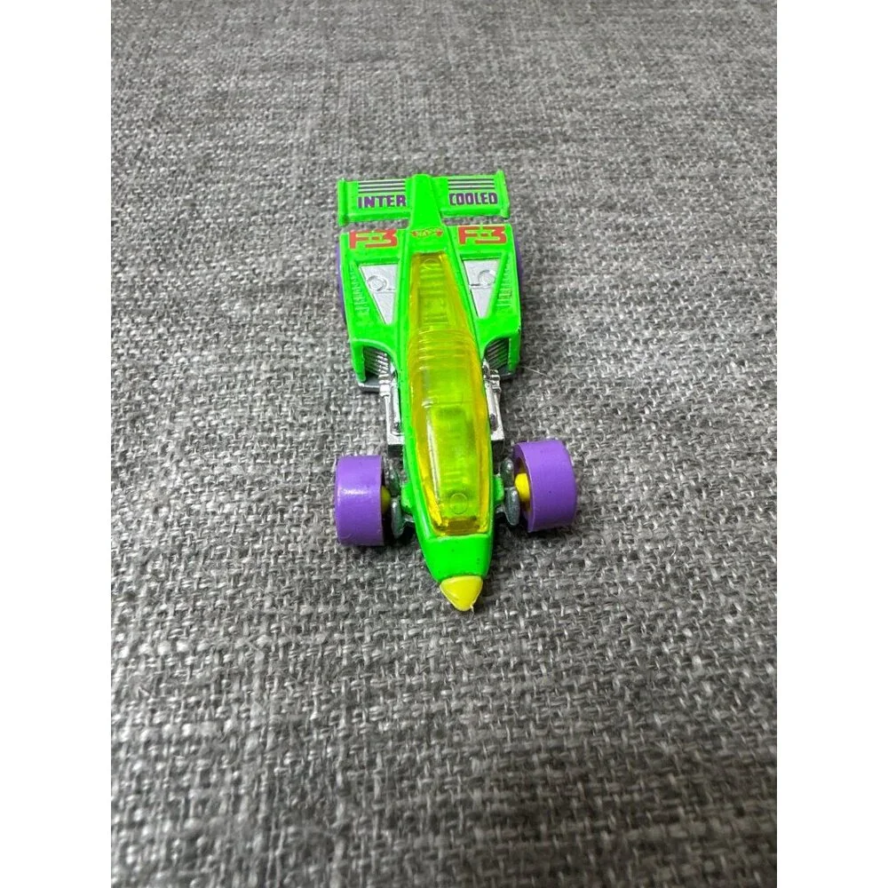 Hot Wheels 1997 Inter-Cooled Green Die-Cast Car With Purple Wheels